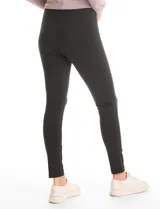 Legging de tiro alto con cintura ancha modeladora y faja interna de compresión. Confeccionado en tejido premium con elasticidad en cuatro direcciones y pierna entallada.