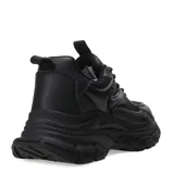 Championes urbanos de estilo chunky, completamente blancos, con diseño de paneles superpuestos en malla y material sintético, cordones al tono y suela de plataforma dentada.