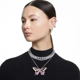 Aros tipo argolla Swarovski, con hilera de cristales blancos de talla cuadrada engarzados en montura plateada con baño de rodio.