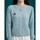 Buzo de punto color azul marino, con cuello redondo y diseño trenzado, de manga larga y calce cómodo.