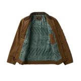 Campera de lona encerada color marrón, con cuello de pana en tono contrastante, cierre frontal con cremallera y botones a presión, bolsillos frontales tipo parche y forro interior de franela.