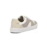 Champion deportivo de mujer, color blanco, con diseño de plataforma gruesa texturizada. Presenta recortes en el cuerpo y cordones negros.