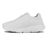 Championes de mujer Comfortflex color blanco con detalles dorados y suela chunky.