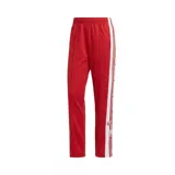 Pantalón deportivo Adidas modelo Adibreak, color rojo con franjas laterales blancas y botones a presión a lo largo de las piernas. Presenta el logo de la marca bordado en la parte superior y etiquetas decorativas en el ruedo.