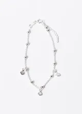 Pulsera de plata 925 con cadena fina y dijes colgantes circulares con incrustaciones de circonitas.