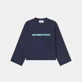 Camiseta de manga larga color azul marino, con corte holgado y estampado frontal del logo "EMESTUDIOS" en color turquesa degradado.