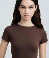 Body liso de manga corta y cuello redondo, confeccionado en poliamida y elastano con cierre en la entrepierna, diseño ajustado al cuerpo de la marca Blue Steel.