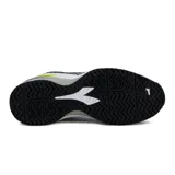 Championes deportivos Diadora modelo Blushield Torneo 2, de color blanco con detalles en negro, gris y amarillo flúor, diseñados para tenis y deportes en cancha.
