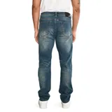 Pantalón de jean CAT para hombre, corte slim, color azul stone lavado, con cinco bolsillos y logo CAT en la parte trasera. Confeccionado en algodón, poliéster y spandex.