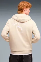 Canguro Puma modelo Class Graphic Hoodie, color crudo con capucha y bolsillo tipo canguro. Presenta un estampado en la espalda con el logo de la marca y la inscripción "Puma Athletics Since 1948".