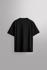 Camiseta térmica de manga corta ranglán, color bordó, confeccionada en tejido elástico con lana. Es transpirable y termorreguladora.