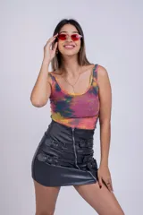 Body de lycra traslúcida con estampado animal print de leopardo.