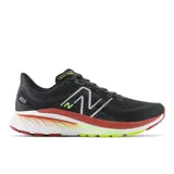 Championes de running New Balance 860, color negro con detalles en blanco, rojo y verde.