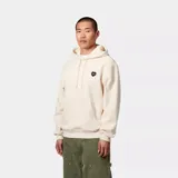 Hoodie color beige con capucha ajustable y bolsillo tipo canguro. Presenta un pequeño parche en forma de corazón negro en el pecho con el logo de la marca.