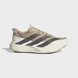 Championes de running Adidas modelo Adizero Evo SL ATR, color beige con las tres tiras características en tono oscuro y suela de plataforma amortiguada blanca.