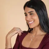 Conjunto de dos collares con dije punto de luz en plata 925 y circonia, con cadena de eslabones finos.