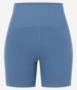 Bermuda ciclista deportiva de microfibra color verde oscuro, de tiro alto y ajuste ceñido.