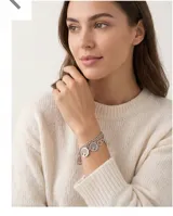 Pulsera doble de acero con cinco dijes colgantes en forma de árbol de la vida.