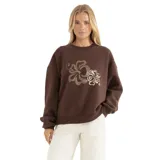 Buzo marrón de corte holgado con cuello redondo y puños acanalados. Estampado de flores en el frente.