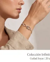 Pulsera de plata 925 con dije central en forma de infinito que incorpora la palabra love en cursiva calada. Cuenta con cadena de eslabones finos y cierre de seguridad.