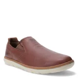 Zapatos tipo slip-on Caterpillar modelo Roamer 2.0, confeccionados en cuero marrón con suela de goma en color crema.