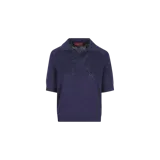 Remera polo Gucci de punto calado con patrón GG entrelazado, manga corta, cuello camisero y terminaciones acanaladas. Modelo de la marca Gucci.