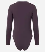 Body de manga larga confeccionado en poliamida y elastano, con diseño seamless y escote cuadrado. Presenta costuras verticales frontales que simulan un estilo corset y cierre con botones de presión en la entrepierna.