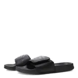 Chanclas Umbro de color negro, con banda superior ajustable mediante velcro y detalle del logo de la marca en relieve.