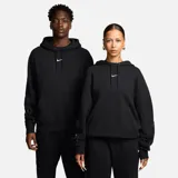 Hoodie negro de la colaboración Nike x Nocta, con logo Nike bordado en blanco en el pecho y diseño minimalista.
