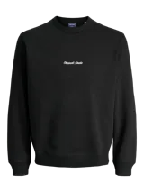 Buzo negro de manga larga con cuello redondo y calce relajado. Presenta un pequeño bordado en el pecho con el texto "Originals Studio" en cursiva blanca.