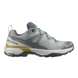 Calzado de trekking Salomon modelo X Ultra 360, color gris con detalles en verde militar y suela con tecnología Contagrip para agarre todoterreno.