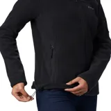 Campera polar Columbia modelo Fast Trek II, color negro, con cierre frontal completo, cuello alto, bolsillos laterales con cierre y un bolsillo adicional con cierre en la manga izquierda.