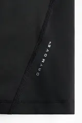 Remera deportiva de manga larga raglán con cuello redondo, confeccionada en tejido funcional DryMove con tecnología de compresión para soporte muscular y costuras planas antifricción.