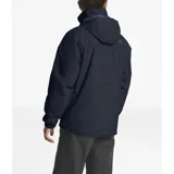 Campera impermeable The North Face Resolve Insulated, color azul marino, con capucha ajustable que se guarda en el cuello, bolsillos con cremallera, puños elásticos y dobladillo ajustable.