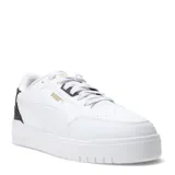 Championes urbanos Puma modelo Shuffle Downtown, de color negro con detalles en dorado. Presentan una capellada de cuero sintético con perforaciones en la puntera, cierre de cordones y suela de goma vulcanizada con tecnología SoftFoam+ para mayor amortiguación.