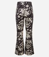 Mono strapless con estampado floral, corte ajustado en el torso y pantalón acampanado.