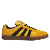Championes Adidas Aloha Super, color amarillo con detalles en negro y suela de goma translúcida.