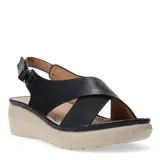 Sandalias de plataforma con tiras cruzadas en el empeine, una de ellas con textura perforada. Cuenta con cierre de hebilla ajustable en el tobillo y suela de goma en color beige.