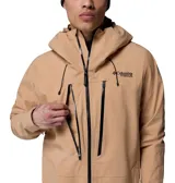 Campera técnica de esquí y snowboard color beige, con tecnología Omni-Tech impermeable y transpirable. Presenta capucha integrada compatible con casco, cierre frontal con revestimiento de PU, ventilación en axilas, bolsillos con cremallera en pecho y manos, y faldón antinieve.