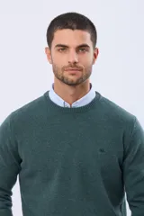 Buzo de lana azul con cuello redondo, manga larga y diseño tejido de punto.