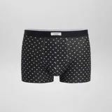 Pack de tres bóxers de algodón elástico con cinturilla elástica con logo. Incluye un bóxer negro con estampado geométrico en gris, un bóxer negro liso y un bóxer negro con estampado de lunares blancos.