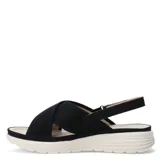 Sandalias de plataforma con tiras cruzadas en tejido técnico color beige y ajuste de velcro en el talón. Posee una suela blanca de diseño ergonómico.