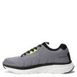 Championes deportivos negros con suela gruesa y texturizada, capellada de malla transpirable y logo de la marca en gris en el lateral.