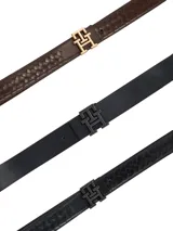 Cinturón reversible de cuero con hebilla metálica que presenta el monograma TH. El diseño cuenta con un lado de acabado liso y otro con acabado granulado.