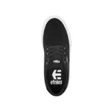 Championes Etnies Singleton Vulc XLT negros con suela blanca y logo de la marca en el lateral.