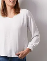 Blusa azul marino de gasa con escote en V y mangas largas con puño. Marca Sioni.