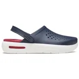 Zuecos Crocs modelo InMotion, con diseño deportivo y ergonómico. Presentan una parte superior azul marino con perforaciones para ventilación, suela blanca de plataforma y detalles en color rojo en el talón y lateral. Incluyen correa trasera pivotante.