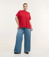 Blusa tipo muscle tee de Ashua, confeccionada en tejido ribana con textura acanalada, cuello redondo y diseño sin mangas.