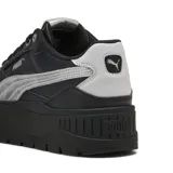 Championes urbanos Puma modelo Karmen II Idol, con diseño de plataforma, color negro con detalles en plateado metalizado en el logo lateral y talón.