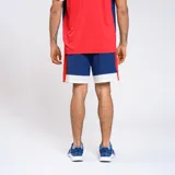 Short deportivo azul con detalles blancos y rojos. Incluye el escudo del Club Nacional de Football y el logo de Umbro.